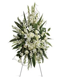 Elegant all-white standing spray featuring fresh flowers, designed for funerals and memorial services."