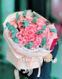 Shop for a stunning bouquet of 55 light pink roses paired with fresh eucalyptus. Perfect for anniversaries, weddings, and special occasions. A fragrant and romantic flower arrangement, hand-arranged with love."