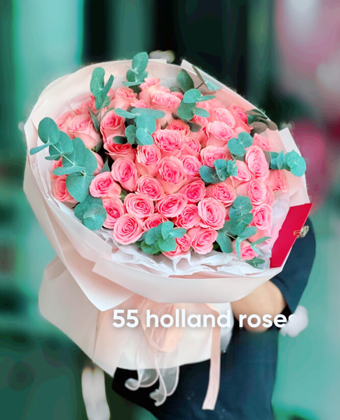 Shop for a stunning bouquet of 55 light pink roses paired with fresh eucalyptus. Perfect for anniversaries, weddings, and special occasions. A fragrant and romantic flower arrangement, hand-arranged with love."