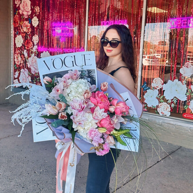 A lavish, magazine-inspired bouquet featuring pink and white hydrangeas, delicate peonies, tulips, and stylish silver accents.