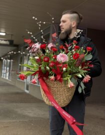 Vibrant Basket Arrangement: Red Tulips, Ranunculus, Greens & Pussy Willow