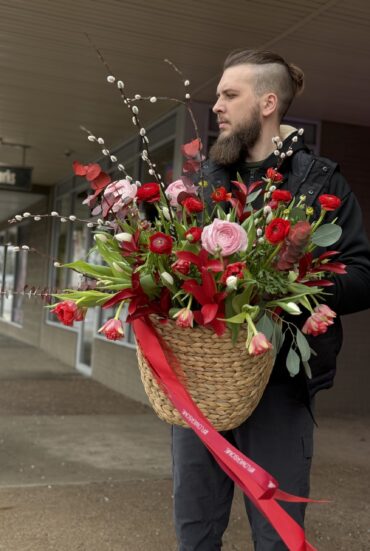 Vibrant Basket Arrangement: Red Tulips, Ranunculus, Greens & Pussy Willow